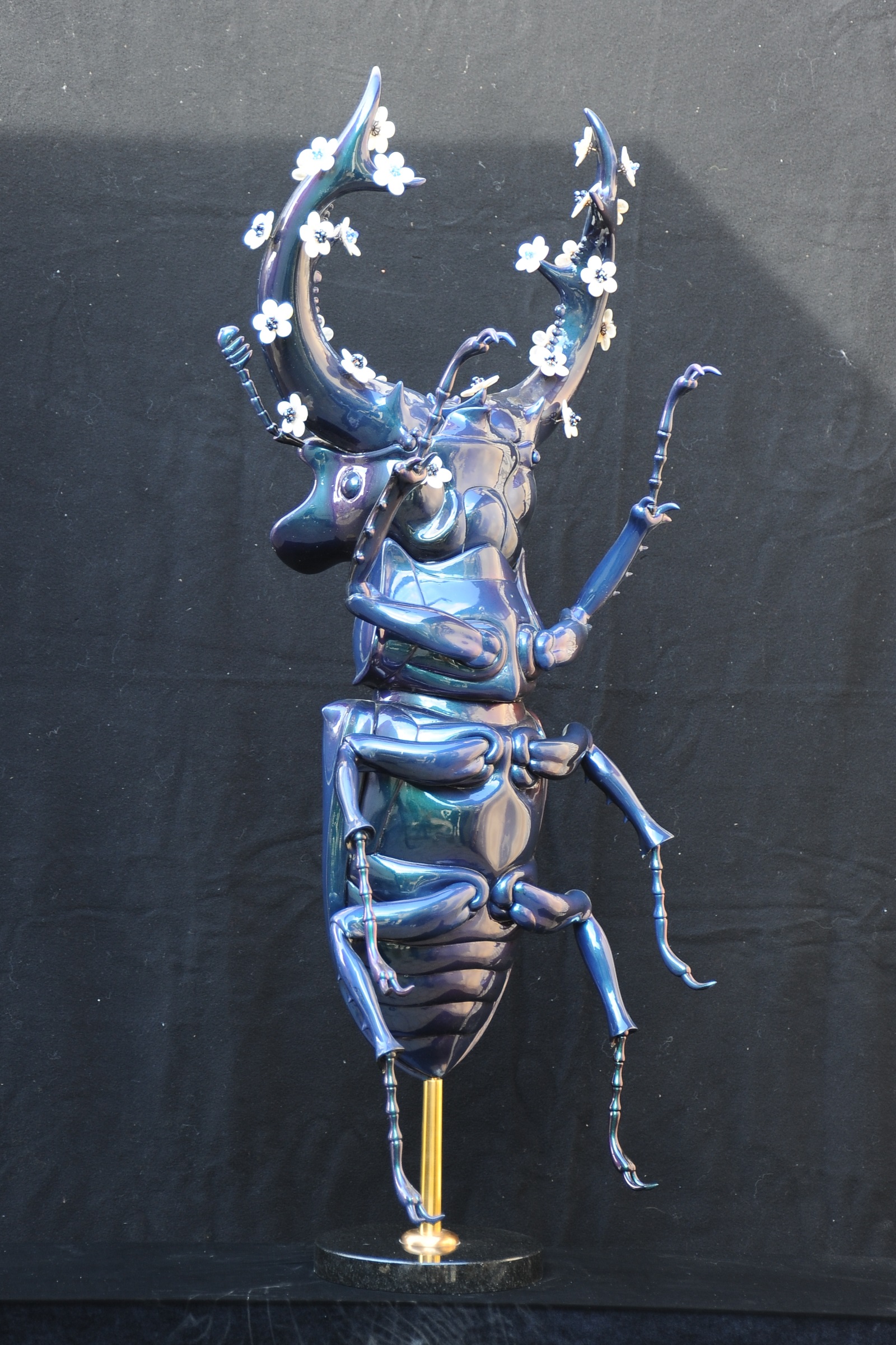 Blossoming beetle, bronze sculpture by Sergey Bondarenko — front view
